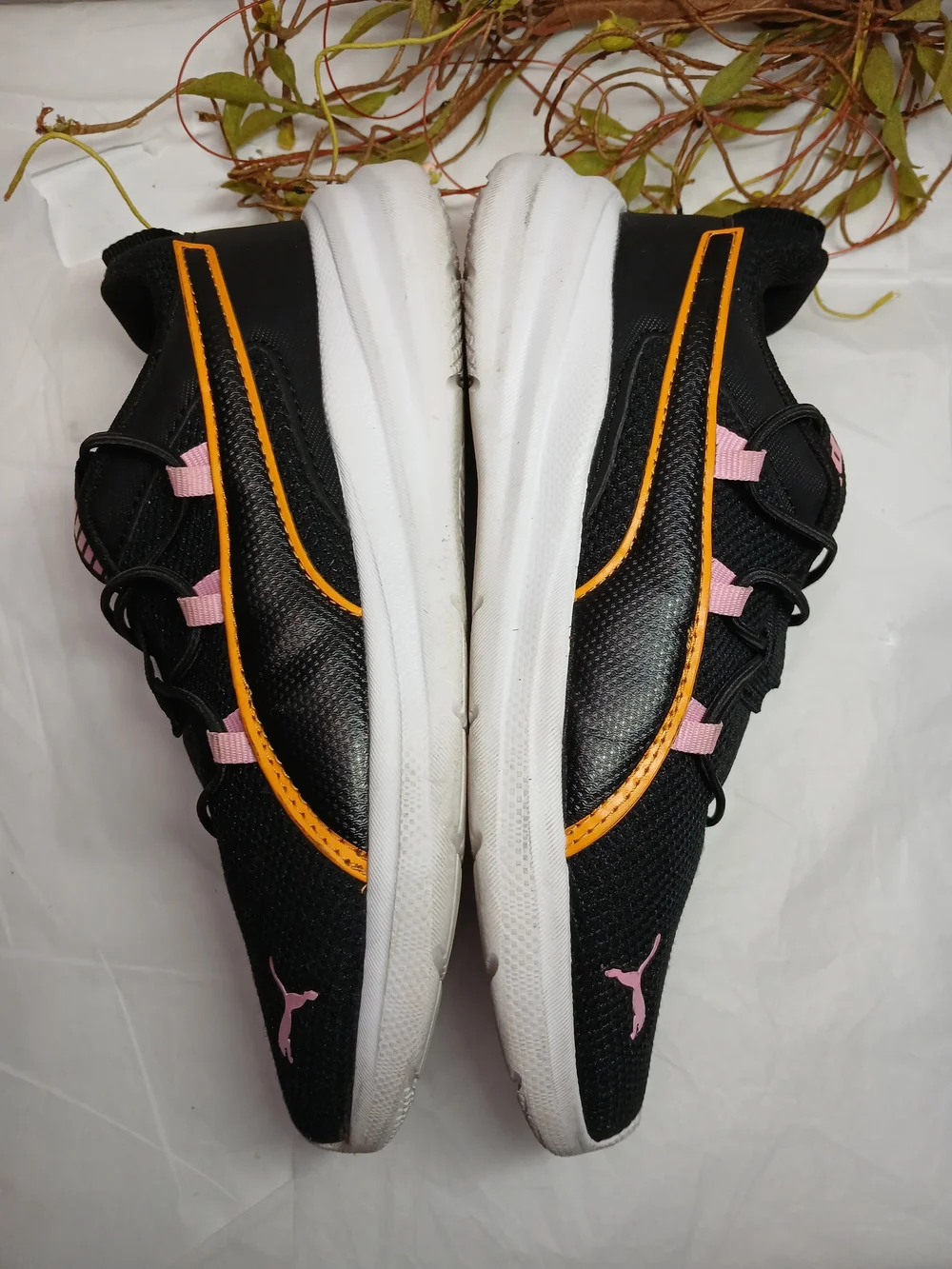 Puma Black Sneakers with Pink Accents and Orange Trim